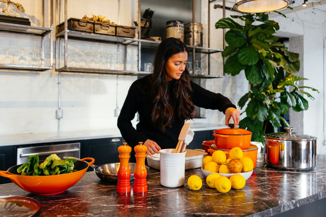 Woman with healthy food options in front of her