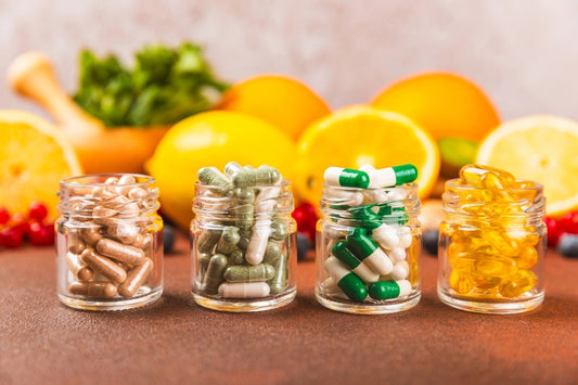 Stack of different supplements in small jars