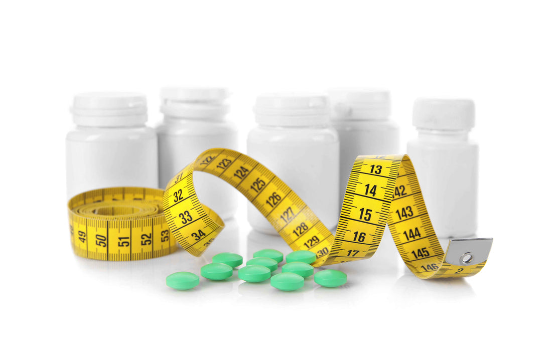 Measuring tape alongside a few bottle supplements